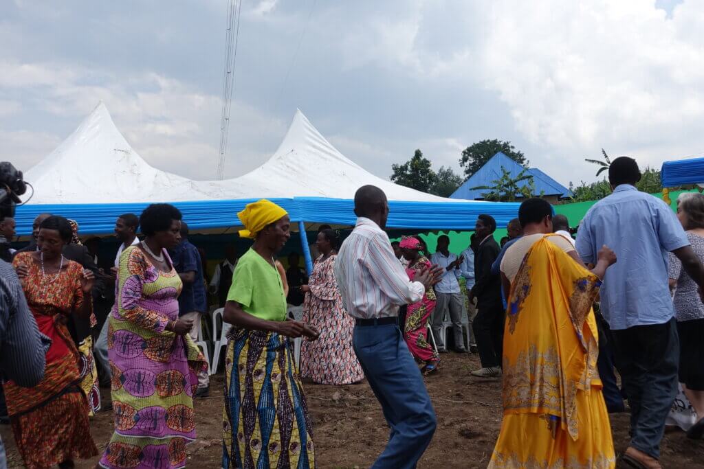 Image of Rwandans dancing and singing in celebration
